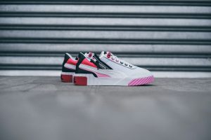 white-black-and-pink low-top sneakers